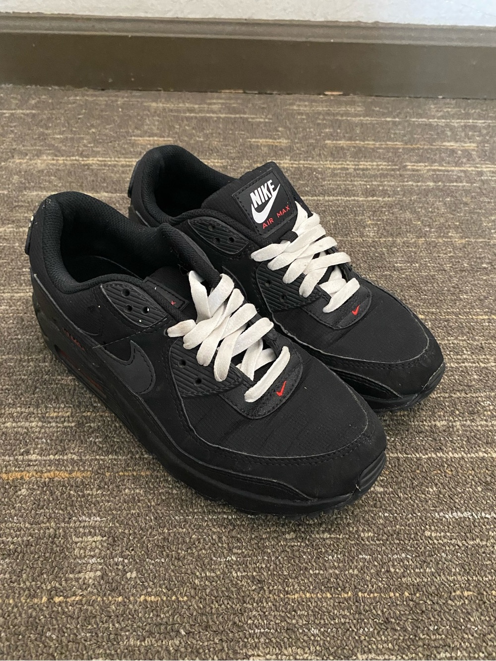 Nike Black and White Sneakers with Red Accents